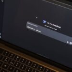 A laptop on a wooden table shows an AI chat interface, featuring the DeepSeek chatbot in action.