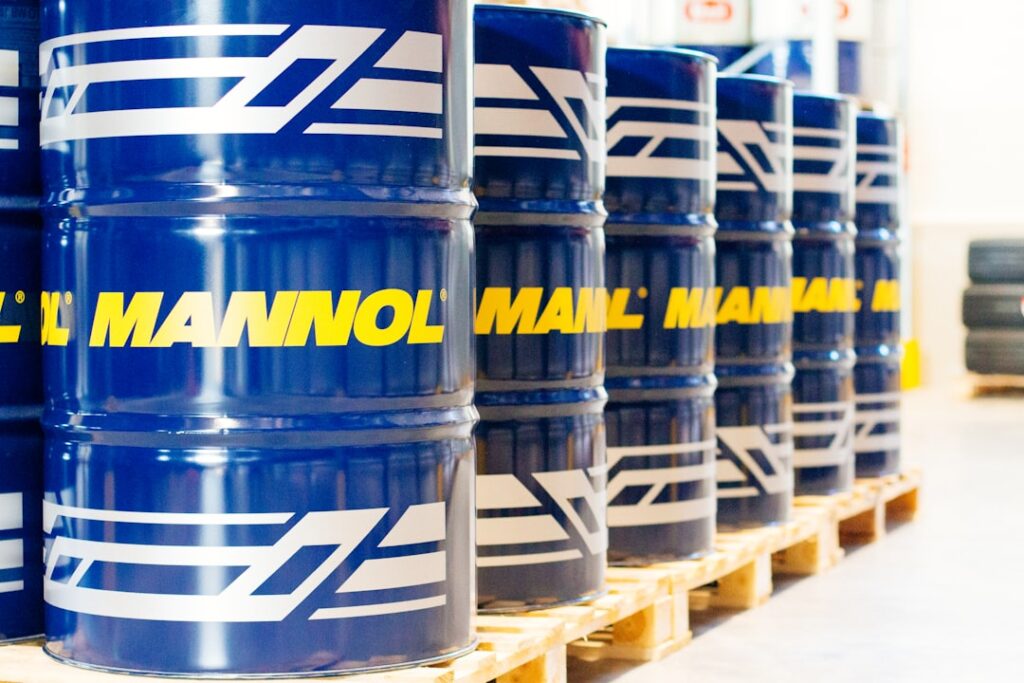 Mannol oil drums, oil barrels in warehouse for industrial editorials, marketing materials.