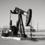 a black and white photo of an oil pump