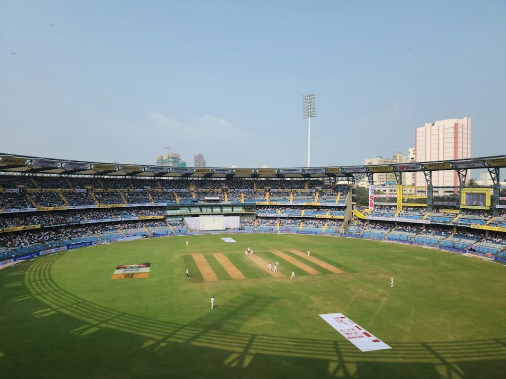A cricket stadium filled with lots of people