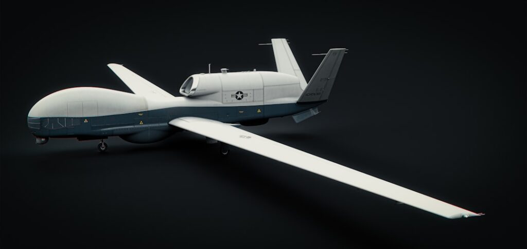 This image depicts a close-up view of a military MQ-4 reconnaissance drone. The unmanned aerial vehicle (UAV) has a slee
