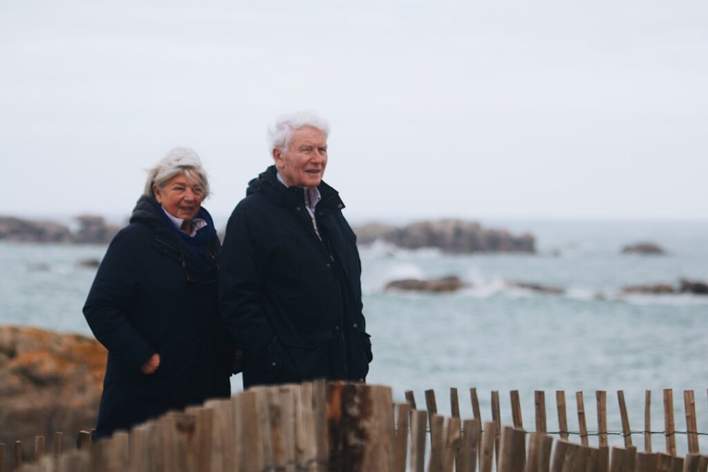 a couple of people standing next to each other