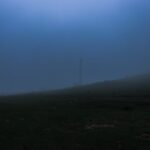 A serene, misty hillside view in the evening at Kümbet, Giresun, Turkey.