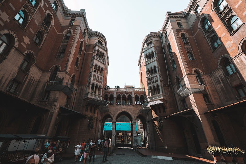 A stunning low angle view of St. Anthony of Padua Church facade in Istanbul with people walking.