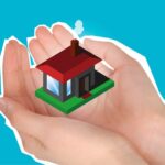 Cutout paper composition with house in handful showing concept of buying private apartment against blue background