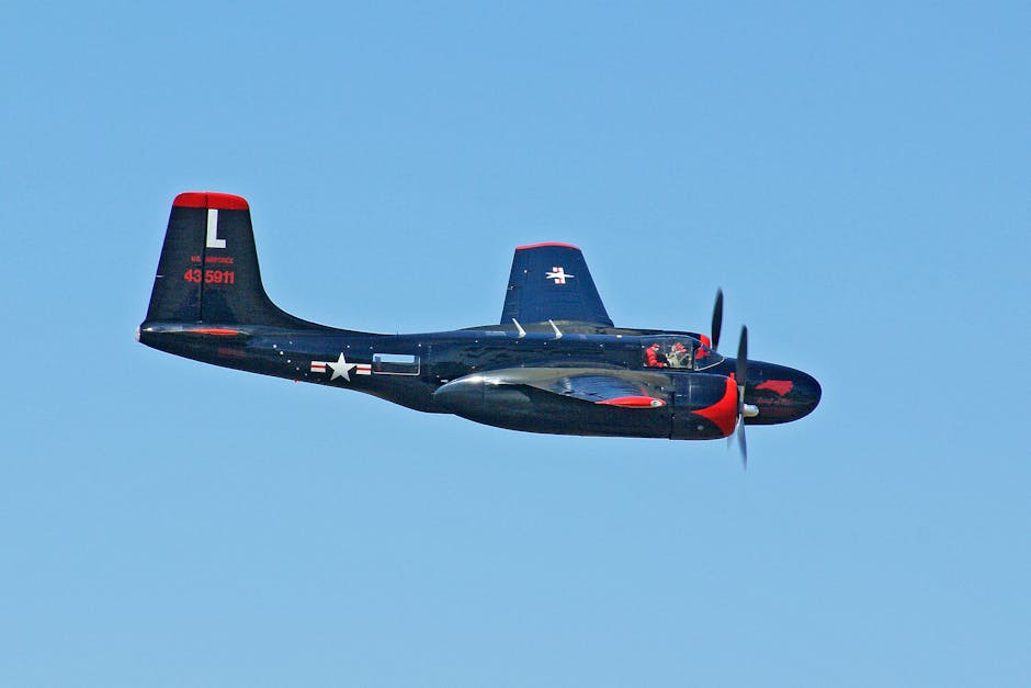 Vintage B-26 Invader aircraft in flight under clear skies, showcasing military aviation history.