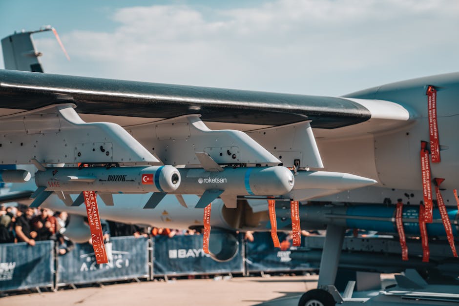 Detailed view of armaments on a Turkish military aircraft displayed at an air show.