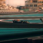 Exciting Formula 1 car racing on the Yas Marina Circuit, Abu Dhabi.