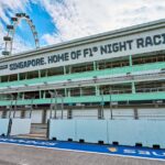 Empty Singapore Grand Prix F1 circuit during the day, showcasing race track and Singapore Flyer.