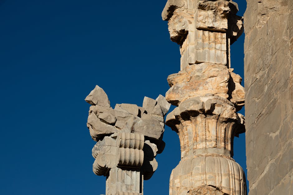 Detailed view of ancient stone columns in Persepolis, Iran.