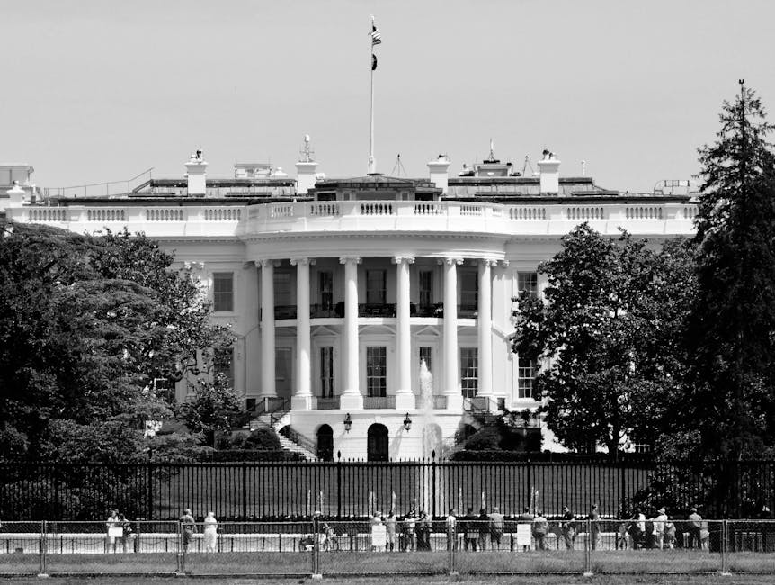Black and white photo of the White House, a symbol of U.S. government, in Washington, DC.