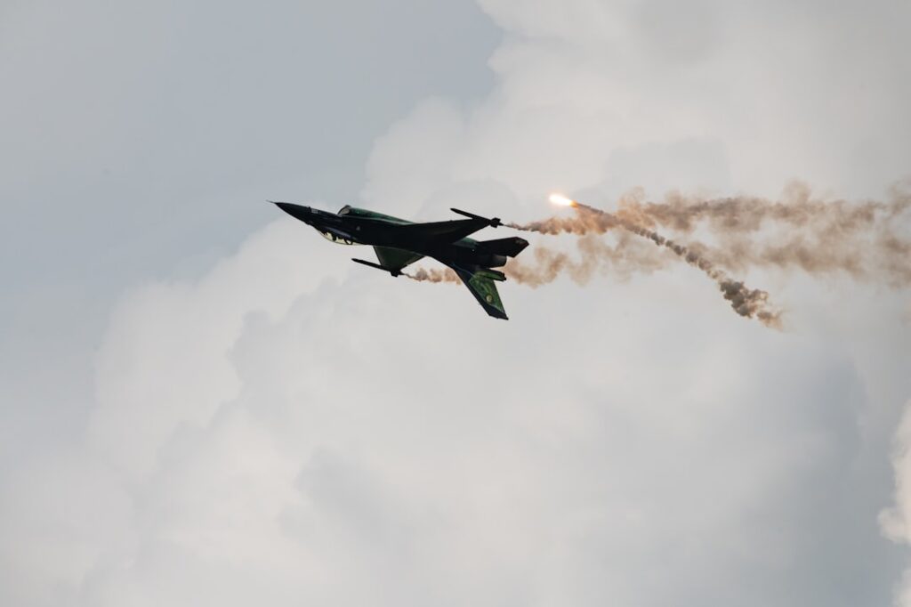 a fighter jet flying through the air