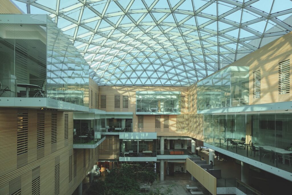 A bright, modern building with a glass ceiling.