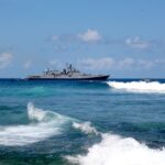 white and black ship on sea during daytime