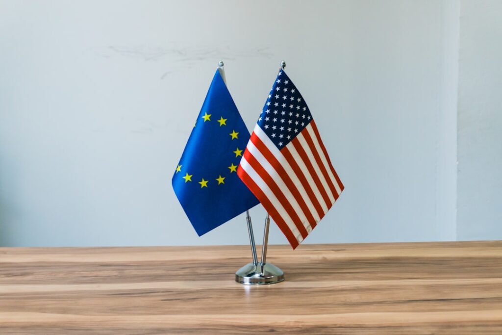 European union and us flags on a table