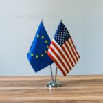 European union and us flags on a table