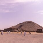 Tourists visiting the iconic Pyramid of the Sun in Teotihuacán, Mexico.