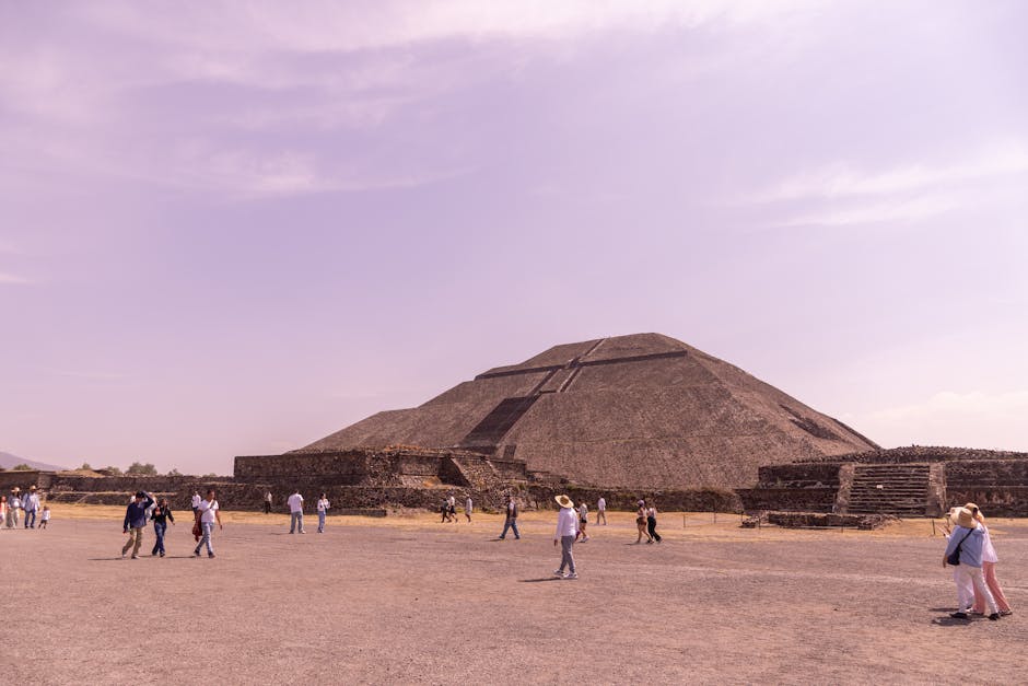 Tourists visiting the iconic Pyramid of the Sun in Teotihuacán, Mexico.