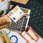 finance economy calculator cash banknotes table statistics data journalism