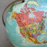 Detailed globe of North America highlighting countries and regions.