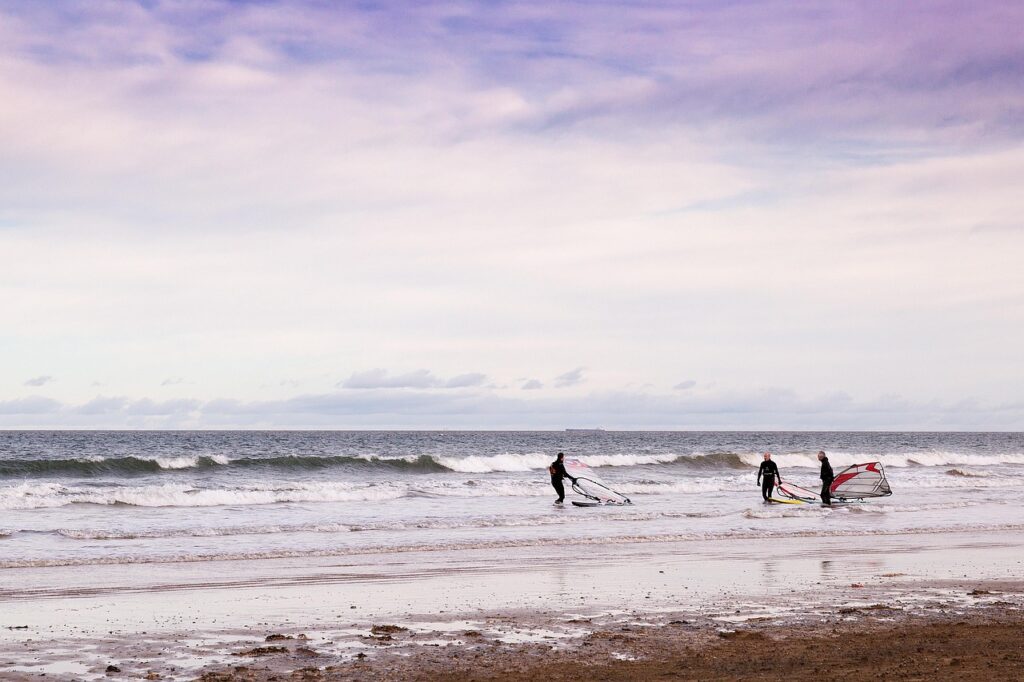 windsurfing, beach, windsurfers, waves, shore, seashore, coast, ocean waves, coatham beach, redcar, north yorkshire, sur