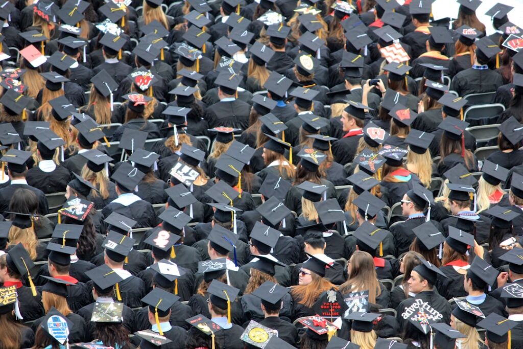 A see of college graduates at the commencement ceremony. If you use this photo, please consider crediting https://www.go