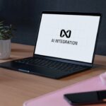Person using a laptop to access AI-driven solutions.