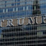 Detailed facade view of the Trump building with reflective glass windows.