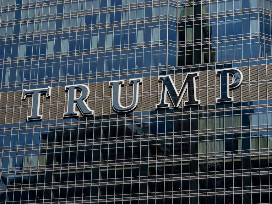 Detailed facade view of the Trump building with reflective glass windows.