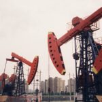 a group of oil pumps sitting next to each other